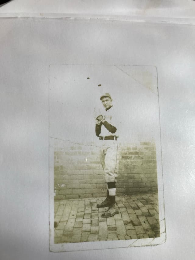 Photograph of Maria Ester Salinas’s father, a semi-pro baseball pitcher, in his baseball uniform.