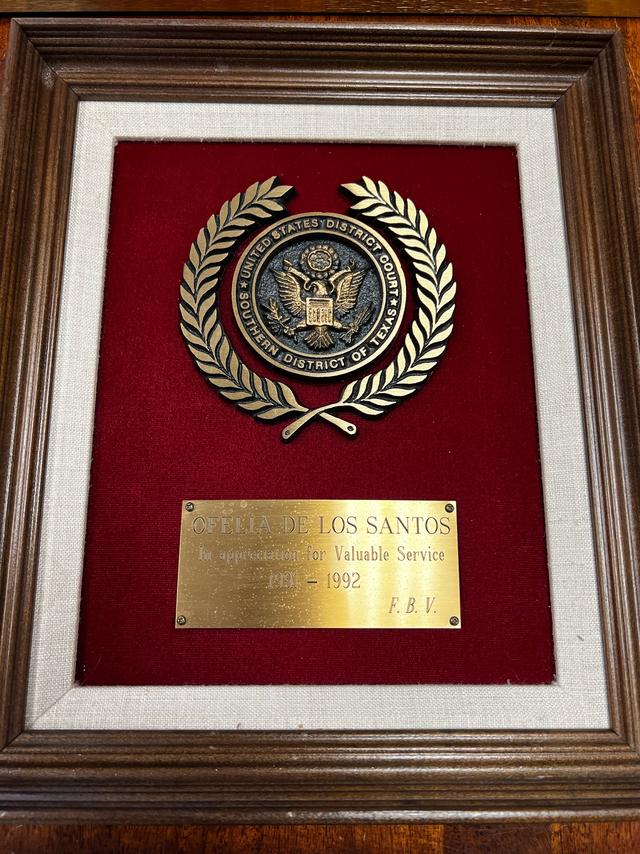 Plaque honoring Ofelia de los Santos “In appreciation for Valuable Service” from the U.S. District Court, Southern District of Texas, 1991-1992.